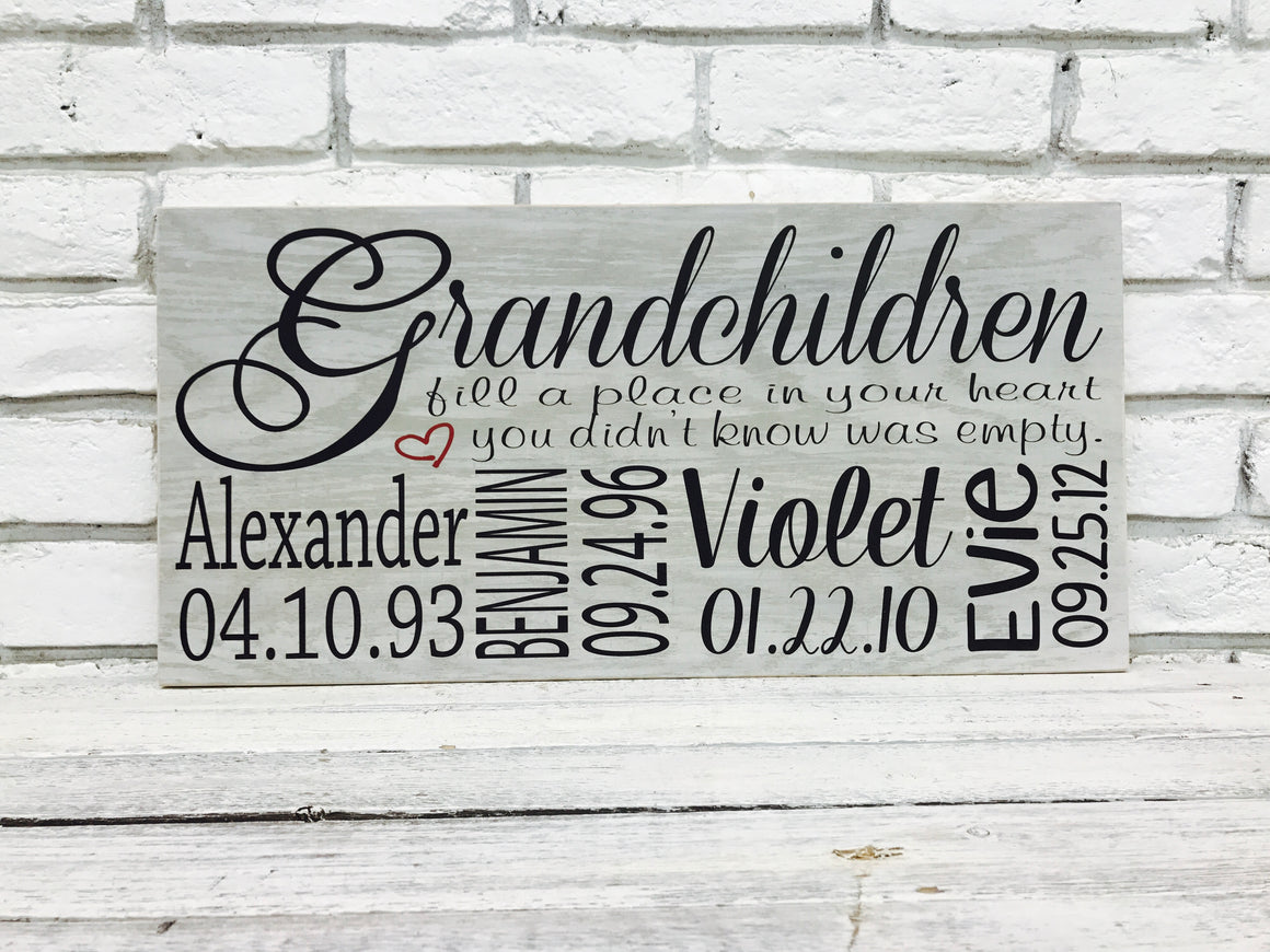 Grandchildren fill a place in your heart important dates wood sign