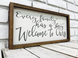 "Every Family Has a Story Welcome to Ours" Wooden Sign