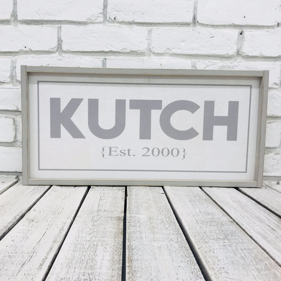 Personalized last name wood sign with distressed wood frame